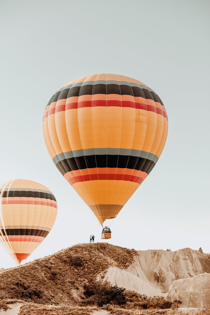 Colorful hot air balloon on sunset sky